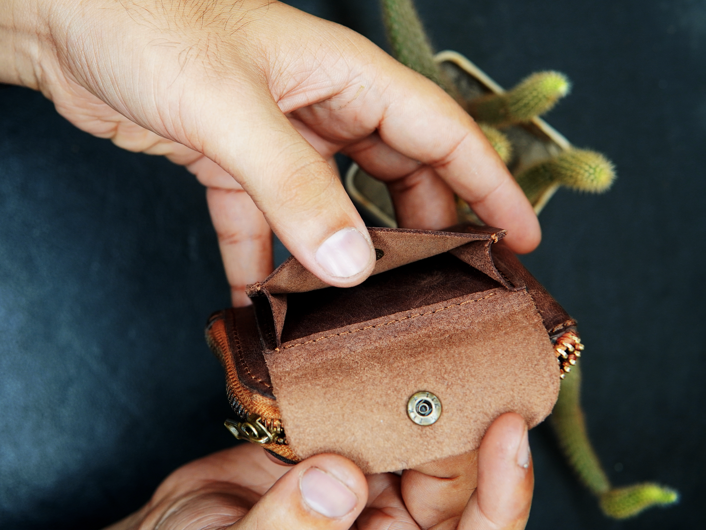 brown leather wallet with button comparment