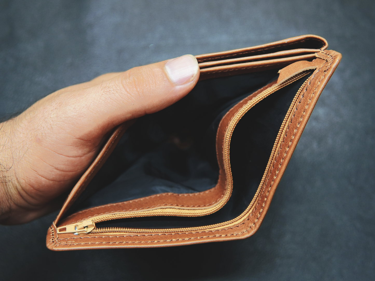 Brown leather wallet with full lenght zipper cash comaprtment