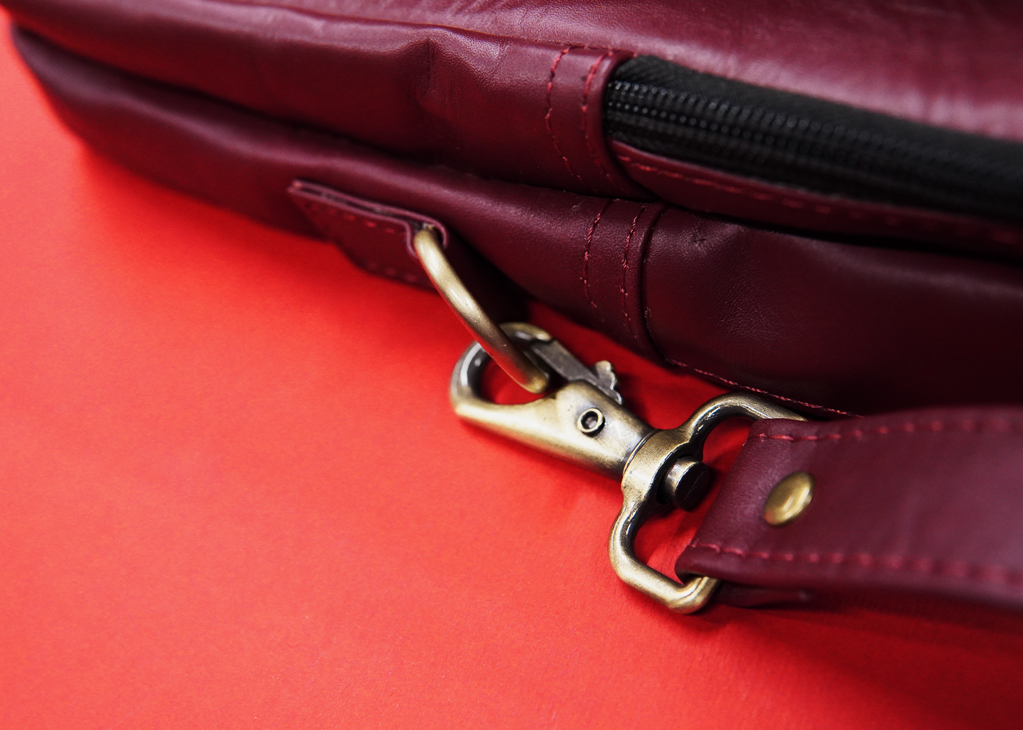 Compact yet spacious crossbody bag with front and back pockets.
