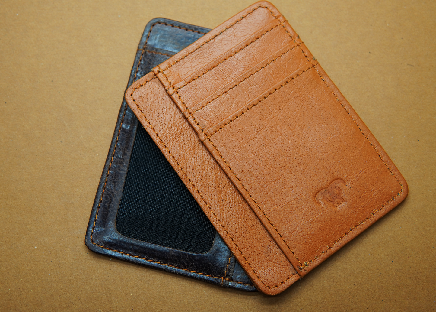 "Minimalist orange card holder with 7 slots – perfect for business and daily use."
