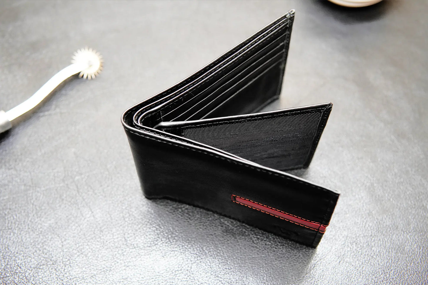 Handmade men’s leather wallet with ID compartments and sleek design