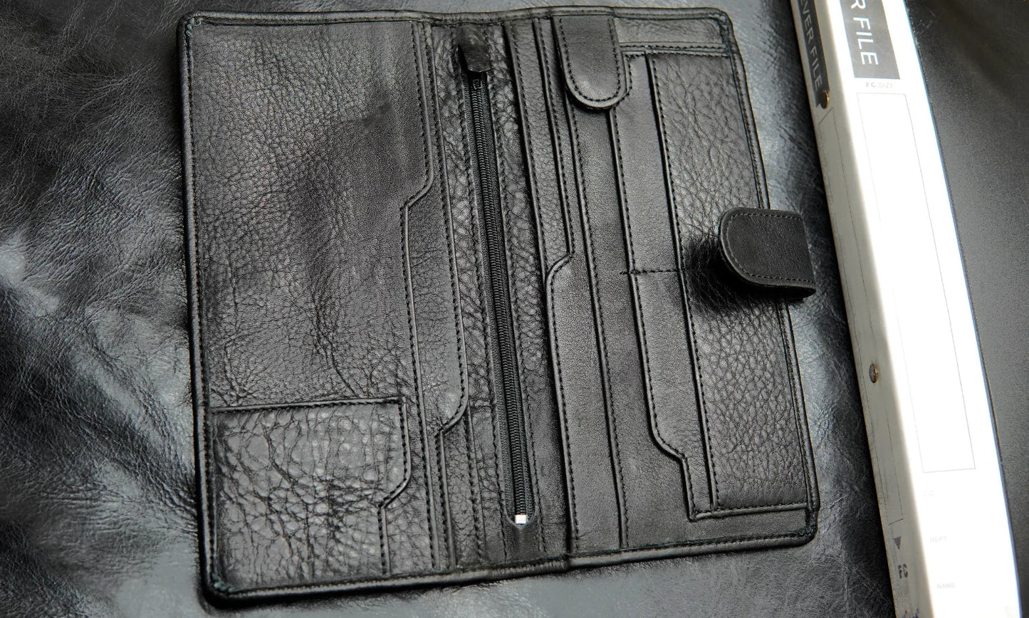 Long wallet for men with ample space for cards, cash, and mobile storage.