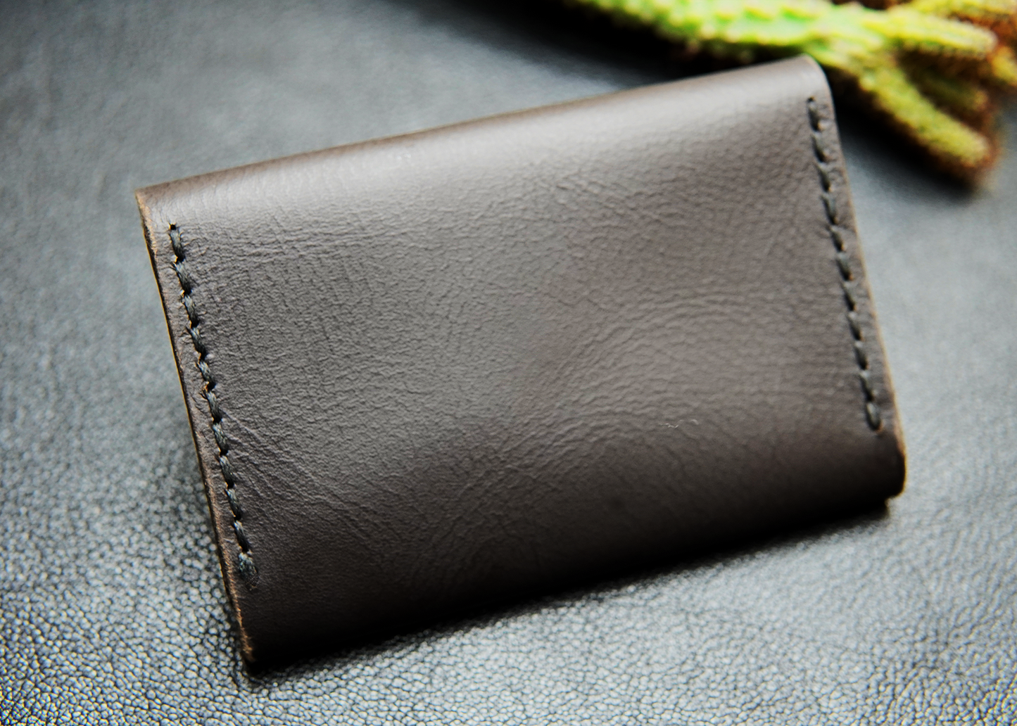 Minimalist leather wallet with essential compartments.