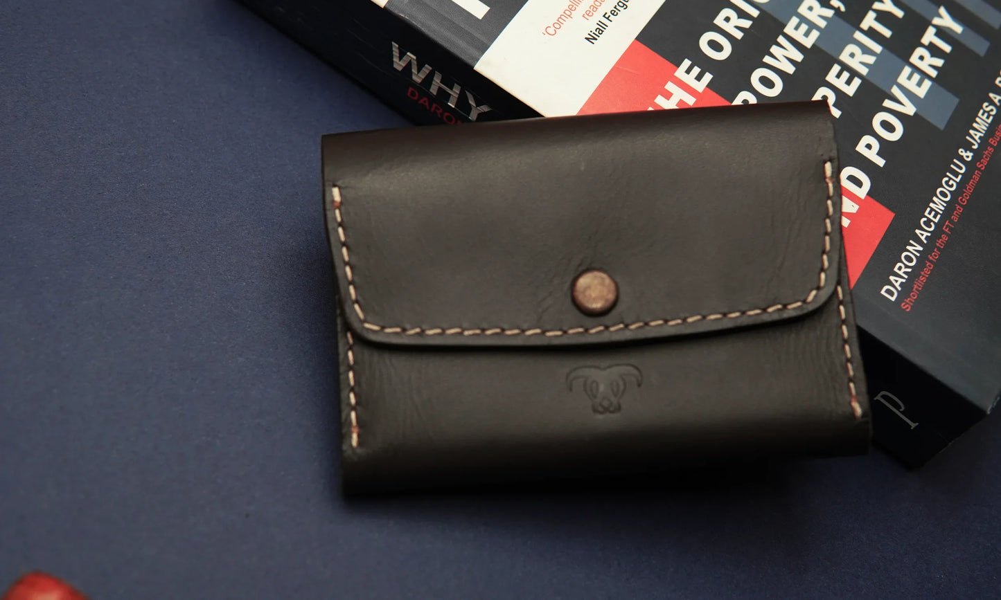 Minimalist men's leather card holder with an elegant finish.