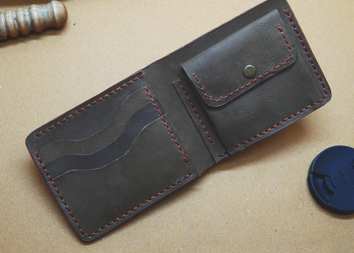 Compact orange wallet design with 3 card slots and cash compartment