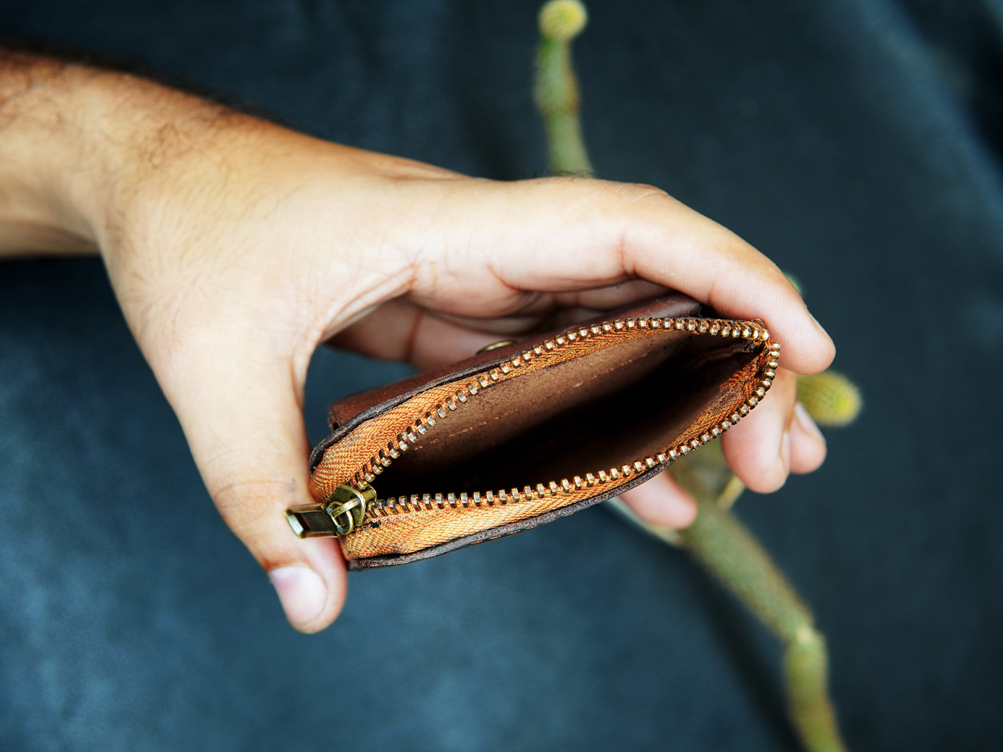 Brown leather wallet with zip compartmen