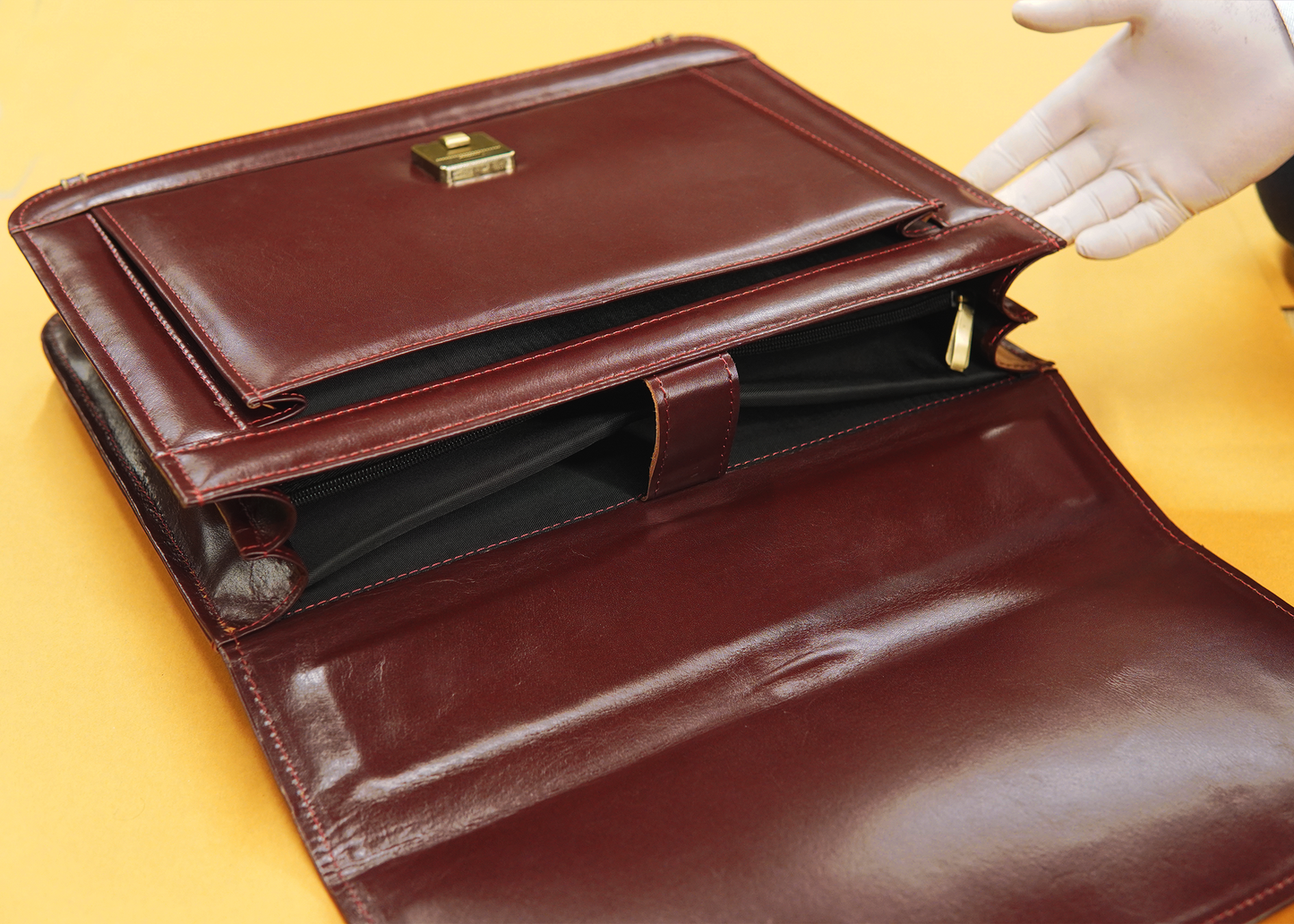 A sleek and spacious leather office laptop bag with 4 compartments, including a dedicated laptop section and a front organizer pocket. Designed for professionals who value organization, style, and functionality. Ideal for business, work, and travel in Pakistan