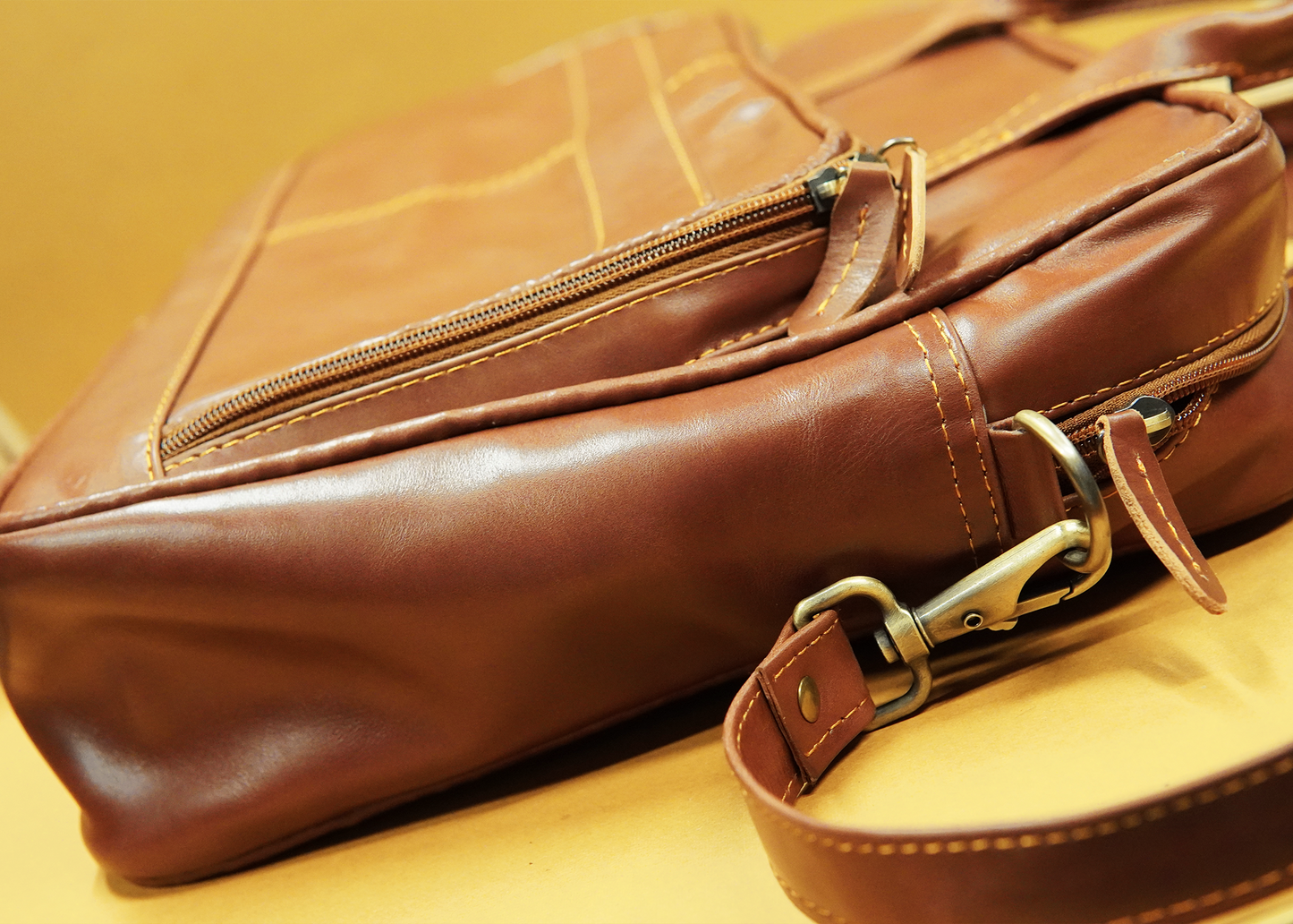 Timeless brown leather office bag with secure storage and sleek design