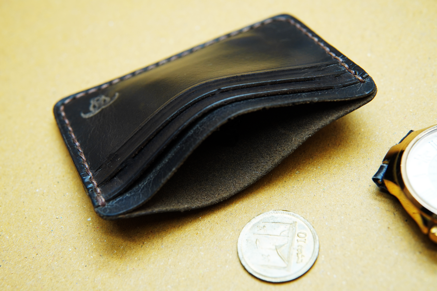 Elegant and durable leather card holder with ample storage.