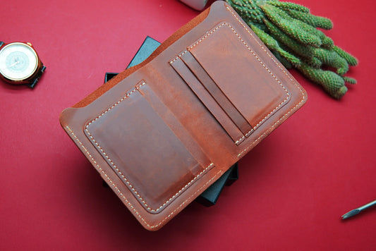 ravel wallet with 6 card slots, 1 cash compartment, and a secure coin pocket.