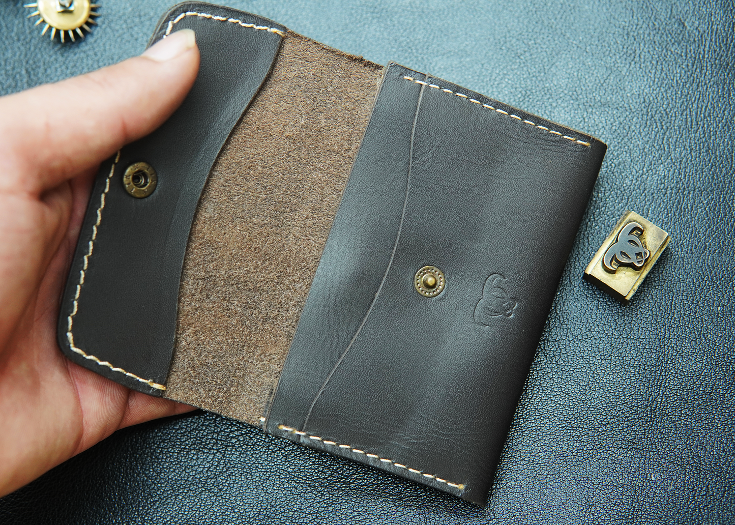 Durable and sleek dark grey wallet with premium leather craftsmanship.