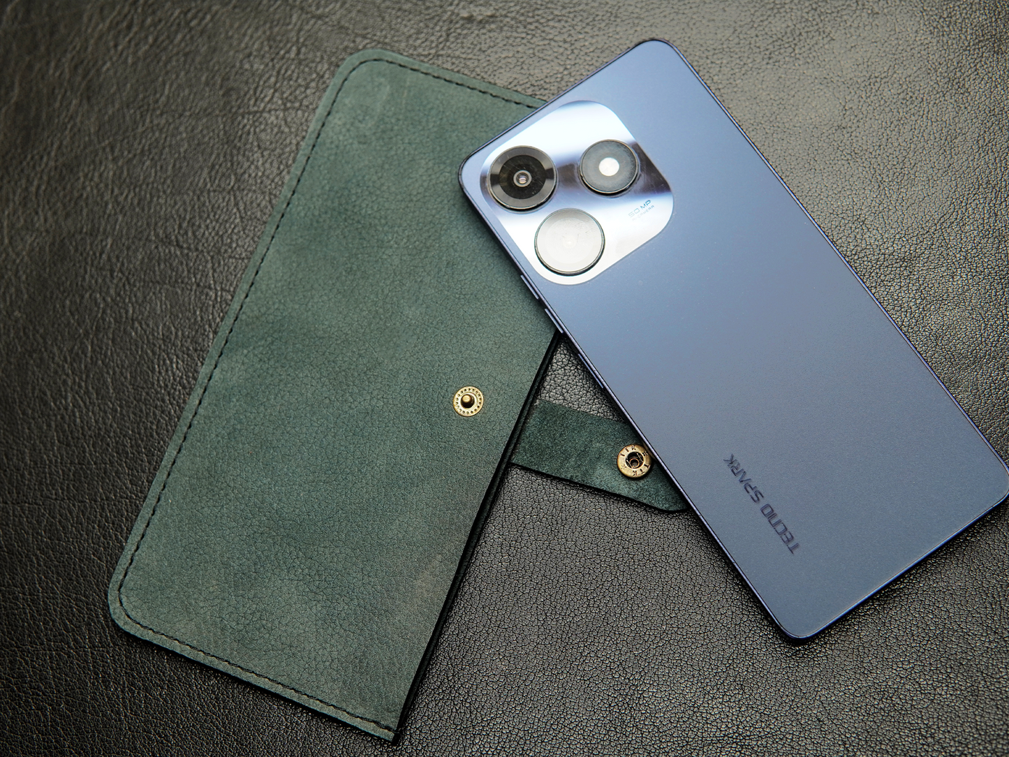Handmade green leather phone sleeve with classic look