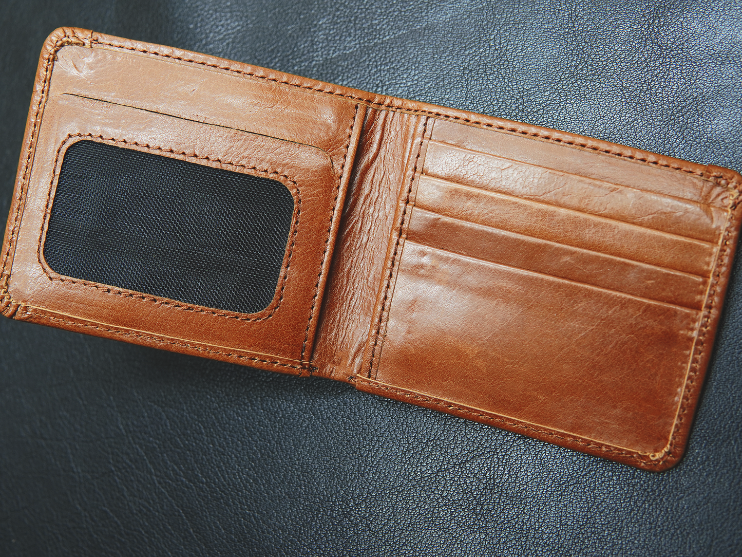 Interior of FlexiFold wallet – 6 card slots, photo ID window
