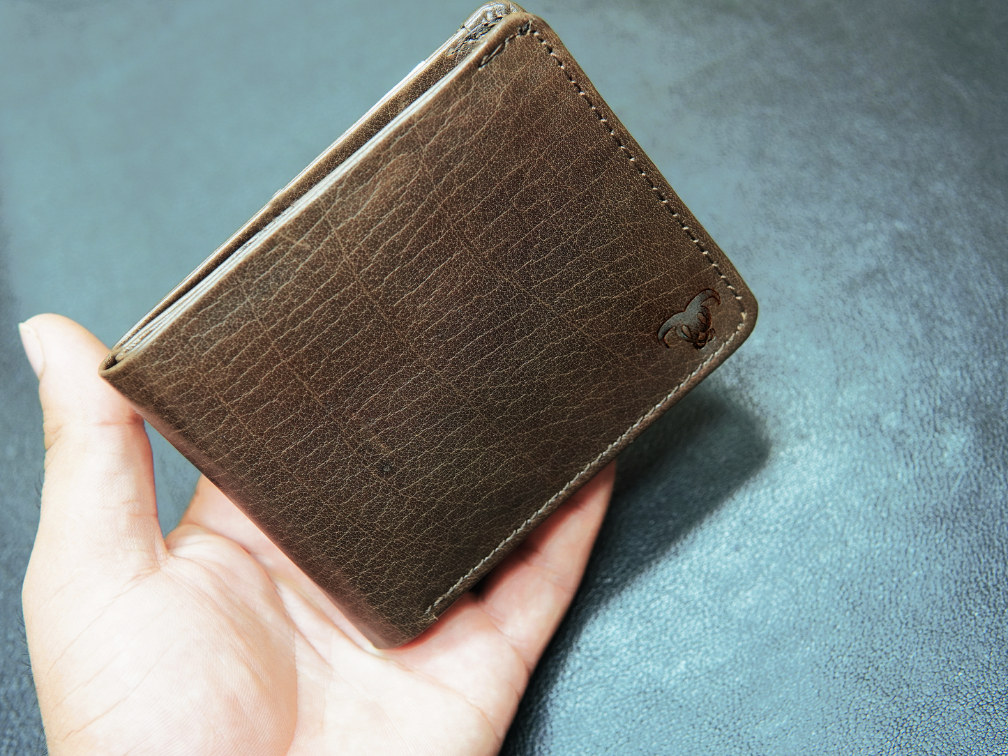foldclassic-wallet-in-hand.jpg FoldClassic leather wallet held in hand – slim, brown, and designed for daily use