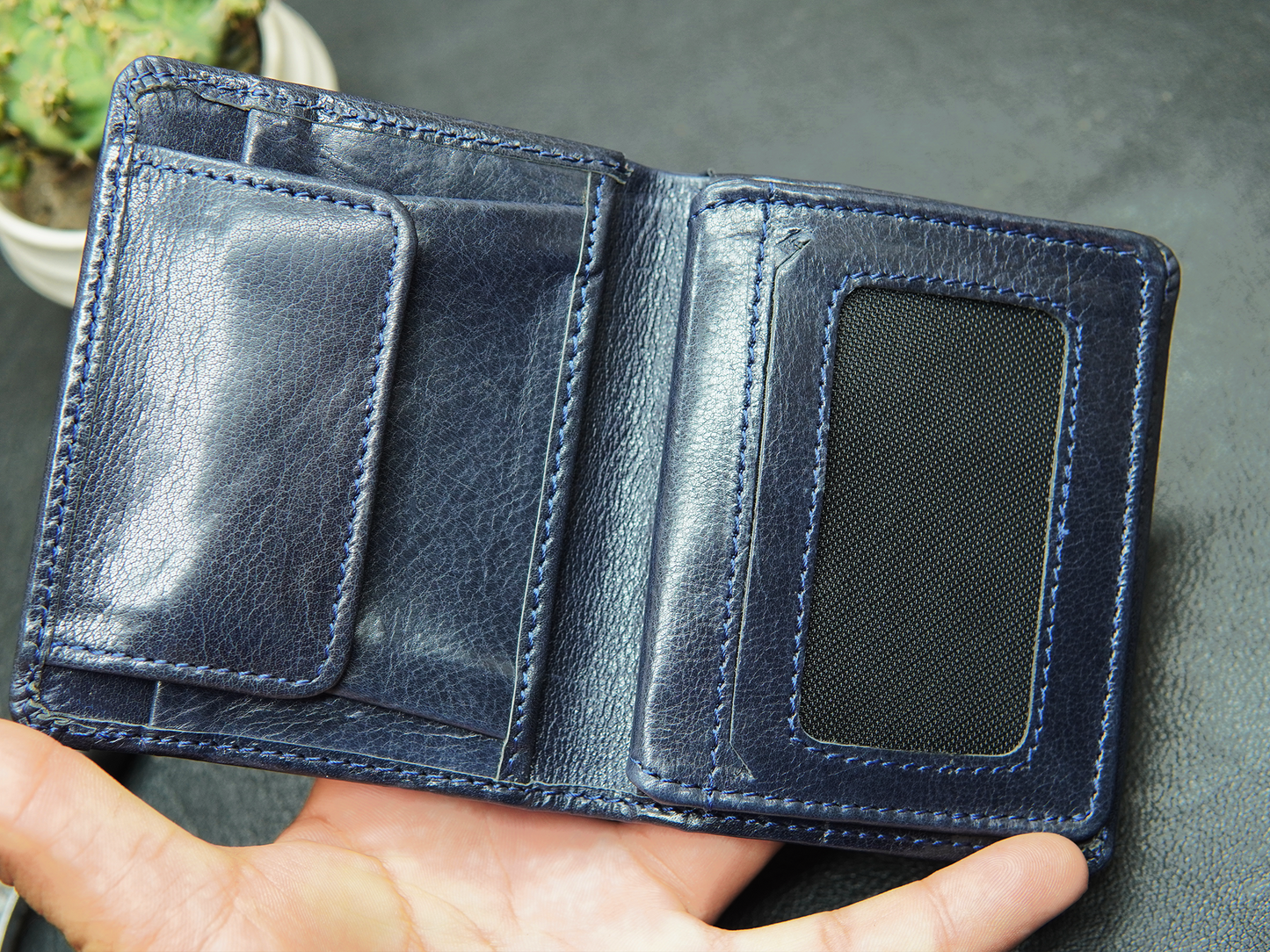 Interior of blue bifold leather wallet