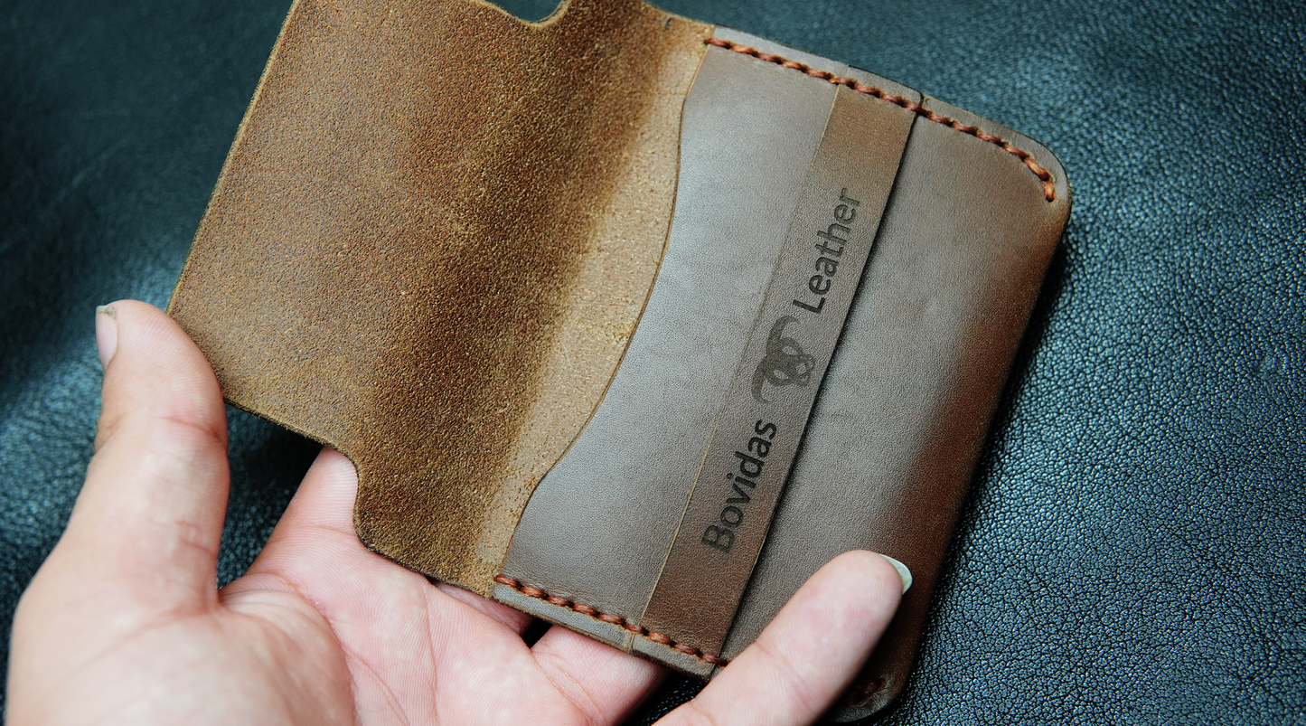Brown leather wallet showing pocket fit and size