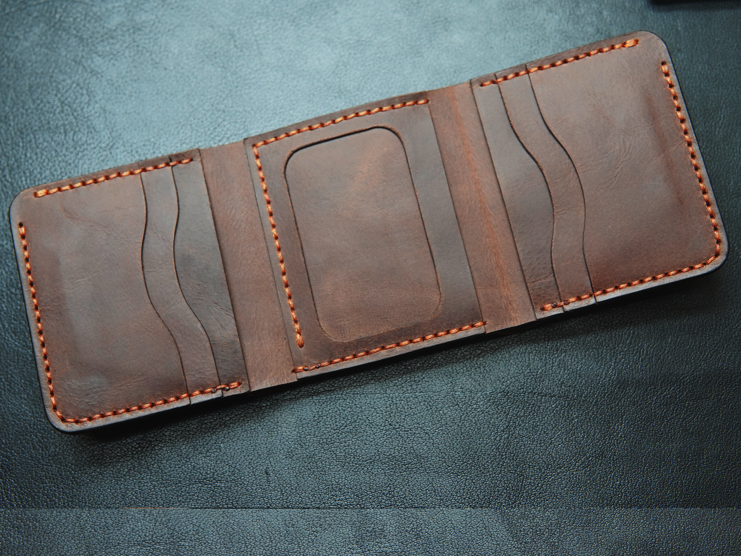 Interior of Cargo wallet showing 3+3 card slots, clear ID window,
