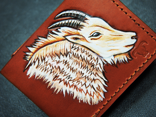 Handmade bifold leather wallet with artwork