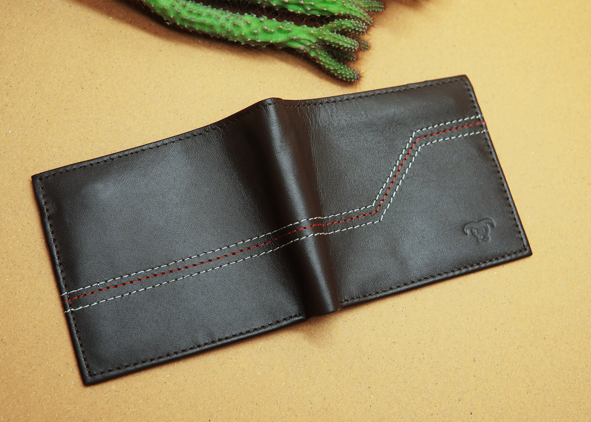 Leather wallet with smooth finish and refined stitching.