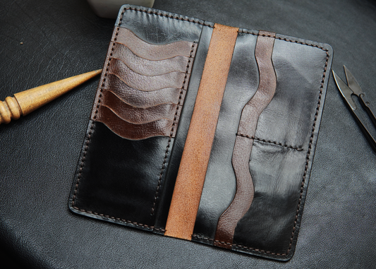 Premium black and brown leather long wallet with 12 card slots and spacious compartments

