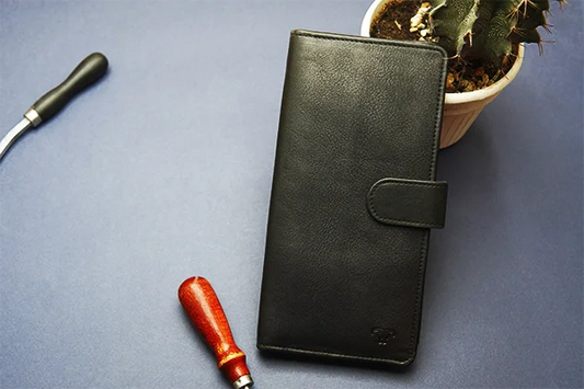 Elegant black long leather wallet with a minimalist design.