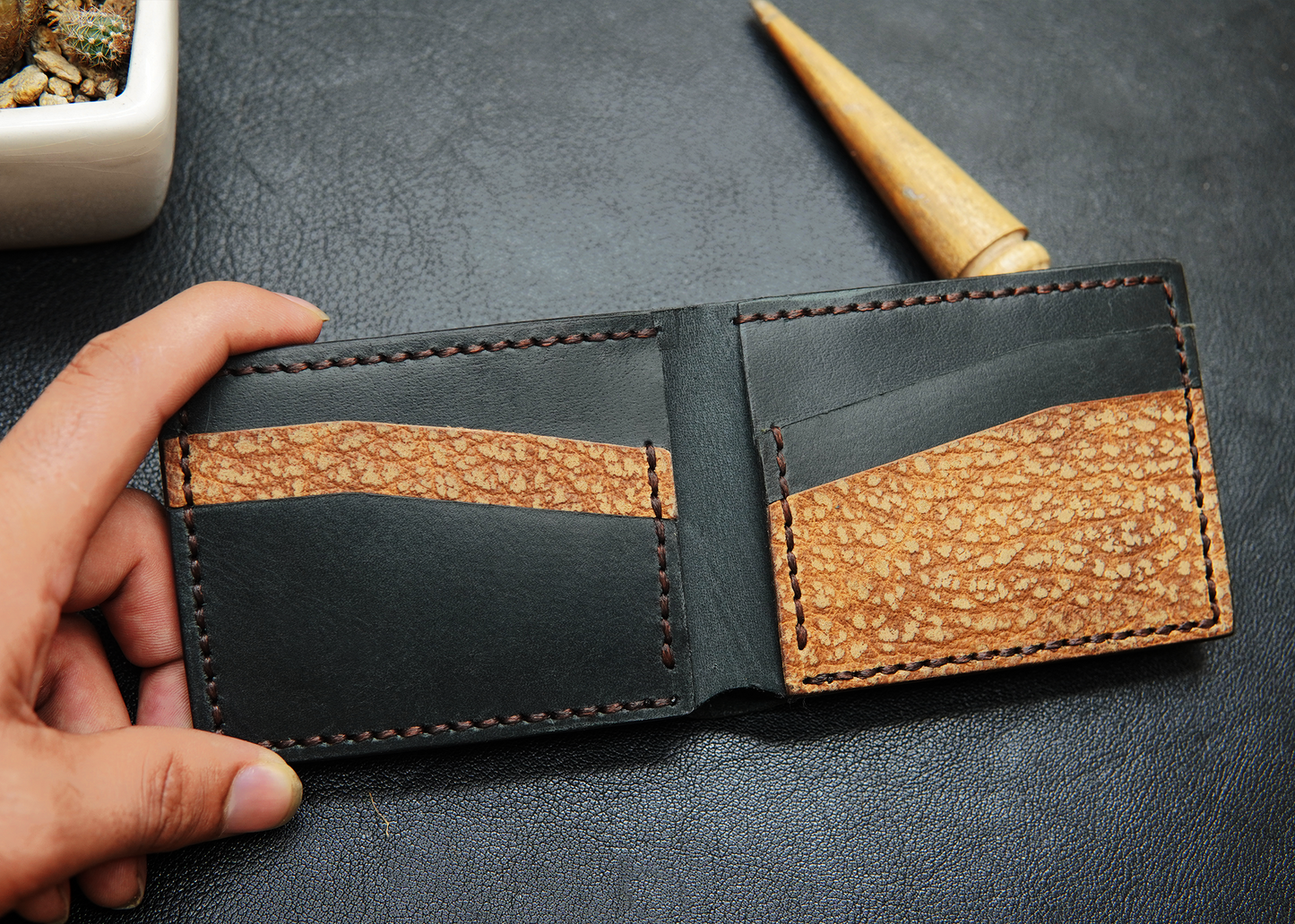 hand-stitched leather wallet with 4 card slots and one cash compartment

