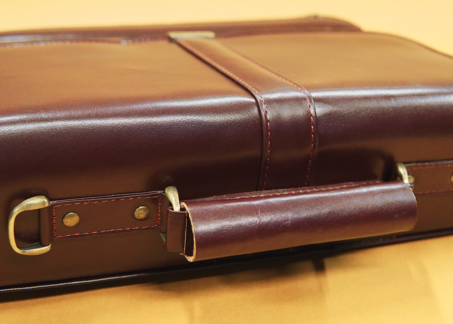 Premium leather office laptop bag with 4 spacious compartments, including a secure laptop sleeve and a front organizer pocket. Designed for professionals seeking style and functionality. Perfect for work, business, and travel. Available in Pakistan