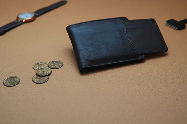  Premium dark brown leather wallet with fine stitching and smooth finish.