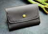 Compact and durable men's wallet with cash storage.

