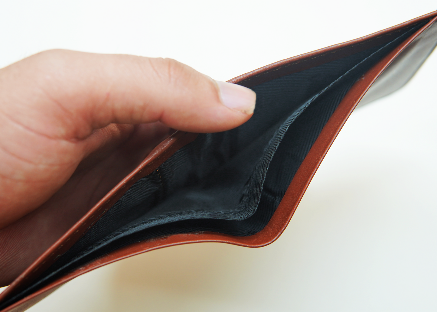 Spacious leather wallet with multiple compartments for cards and cash.