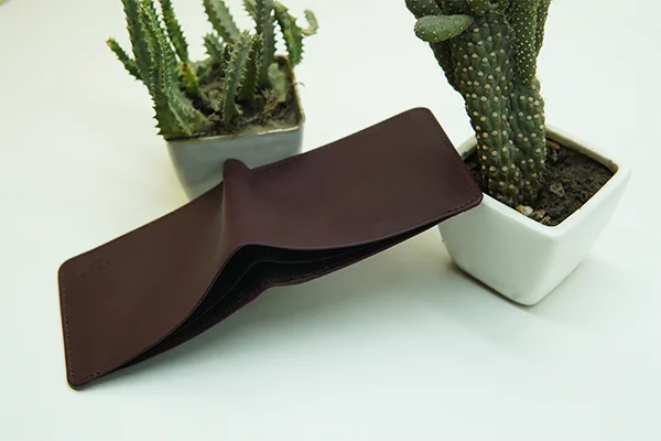 Slim leather wallet with spacious design for daily use.