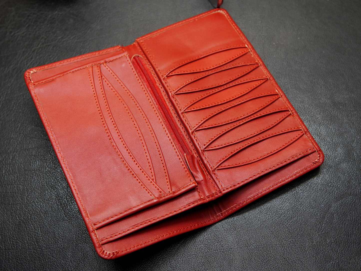 Red leather wallet with multiple cards slots
