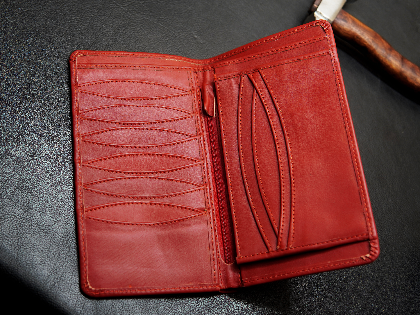 Red leather wallet with multiple card and reciept slots