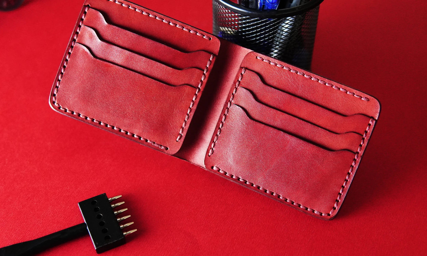 Handmade red leather wallet for men with 6 card slots and a cash compartment.

