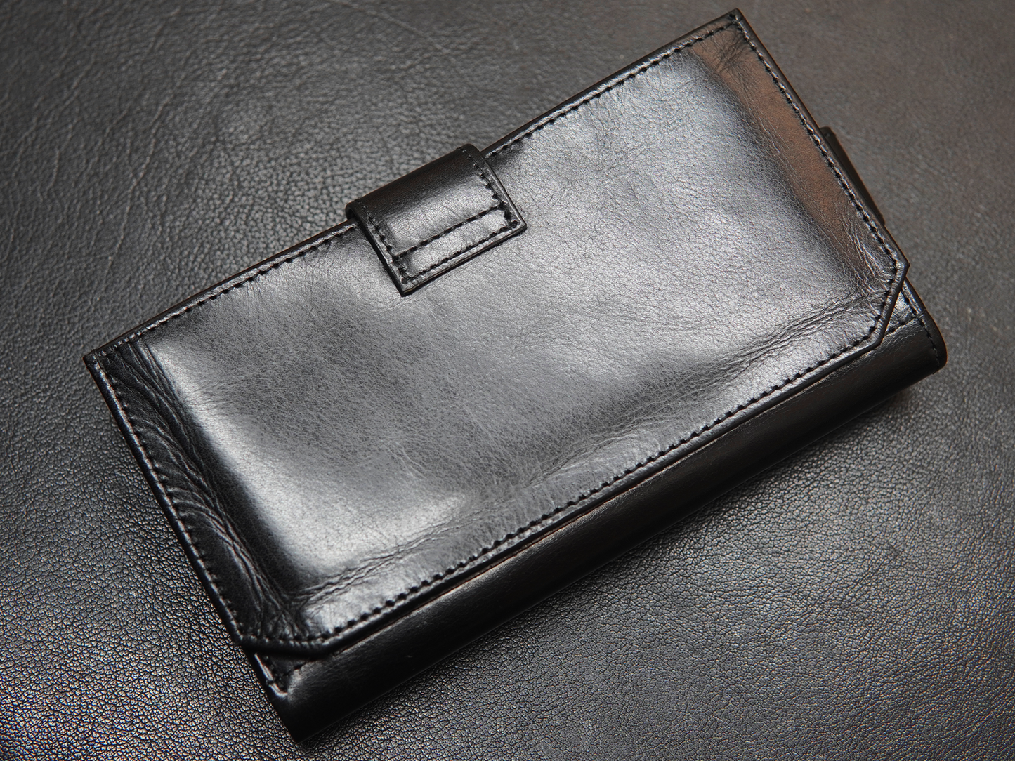 Black multifunctional leather pouch
