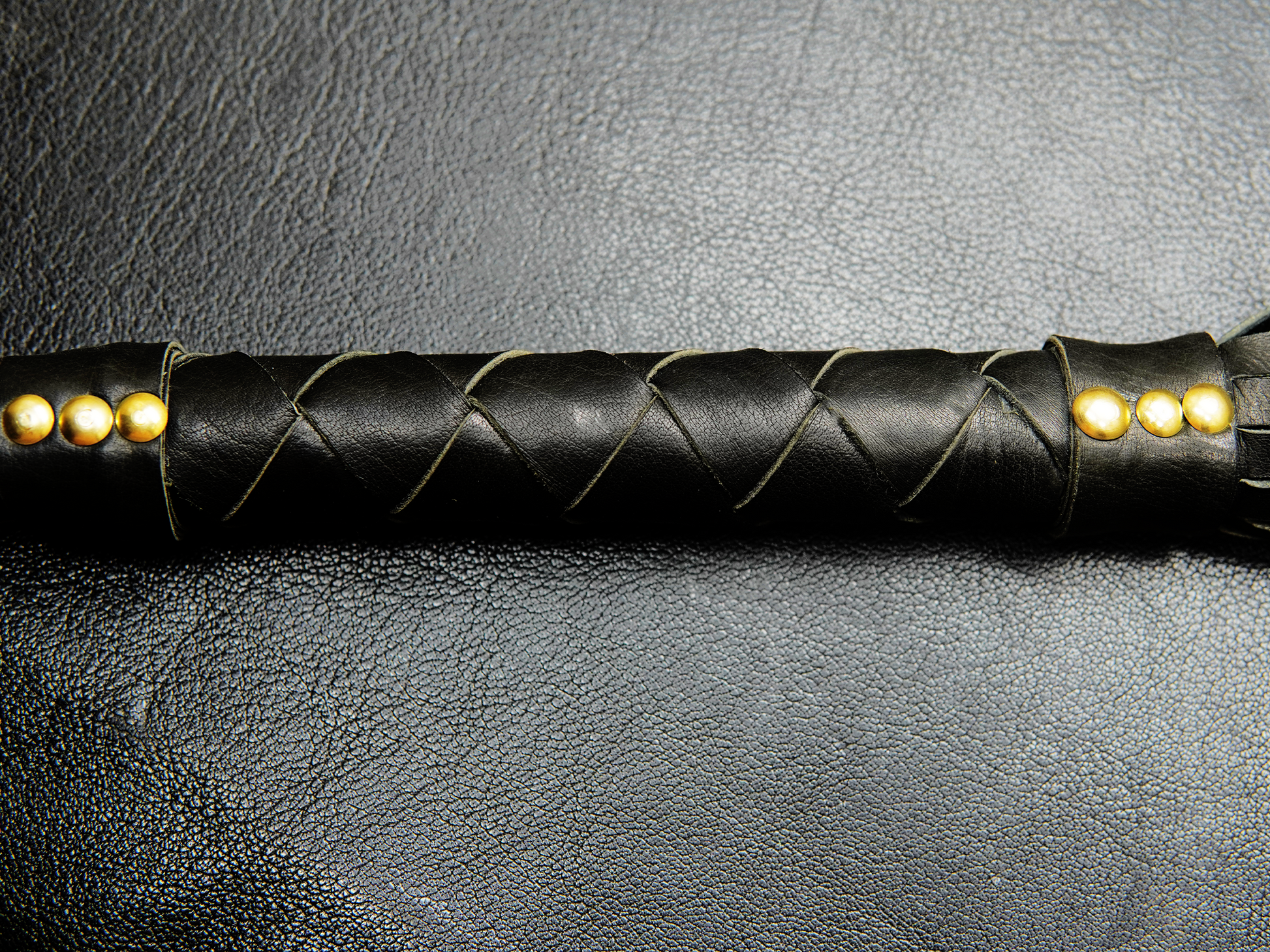 Close-up of braided leather handle for steady grip – Fits Flogger by Bovidas