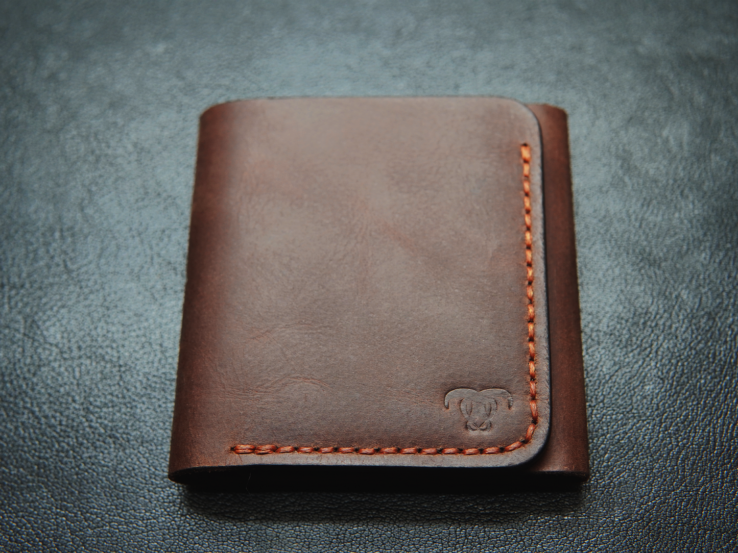  full-grain leather texture and hand stitched