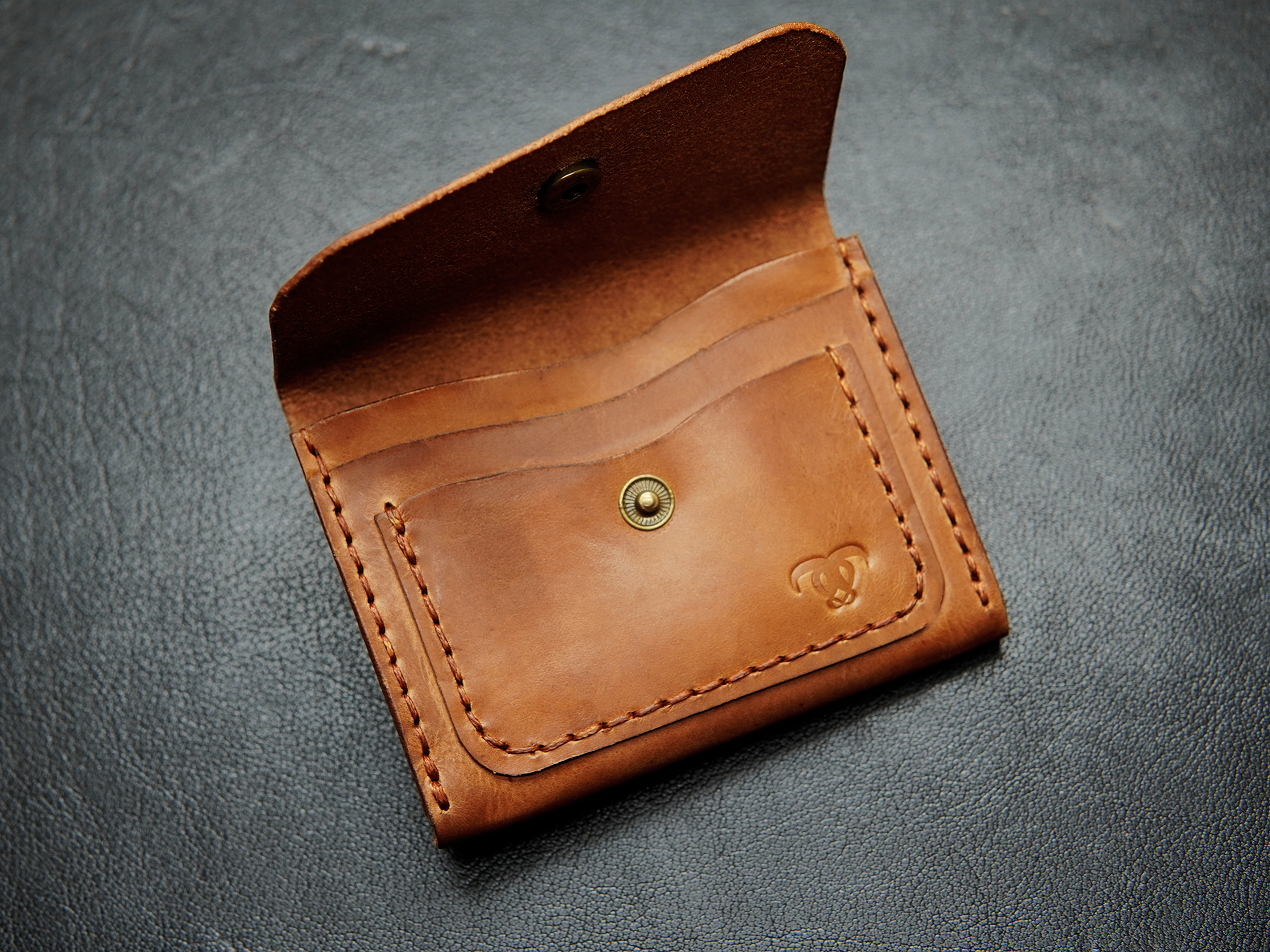 Interior of handcrafted leather Flick card holder showing 4 card slots and cash space – built for essentials.