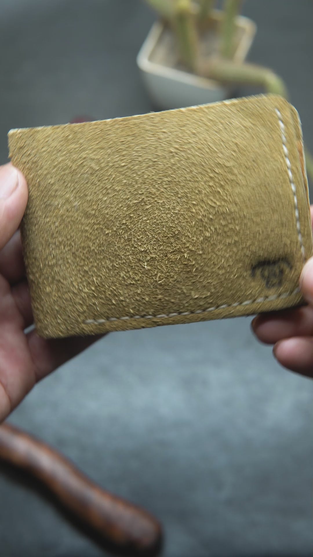 video howing the detail view of handmade leather wallet