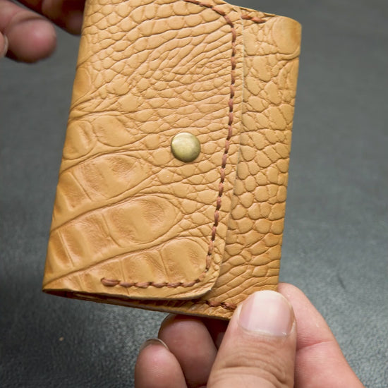 Video showing the detail of Crocodile texture handmade leather wallet
