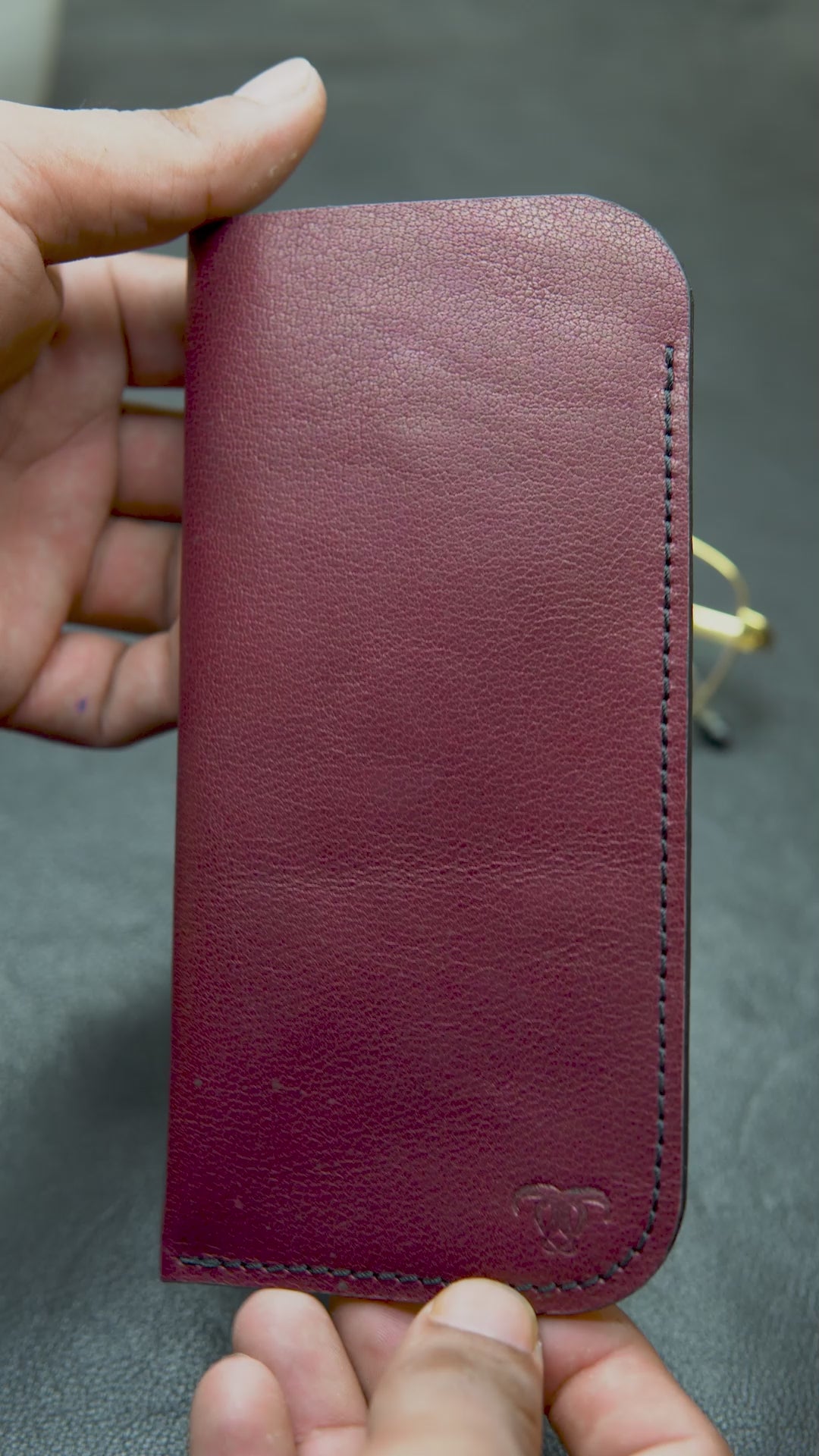 "Video showing the Bovidas Crimson Guard – red handcrafted leather glasses case with soft interior padding"