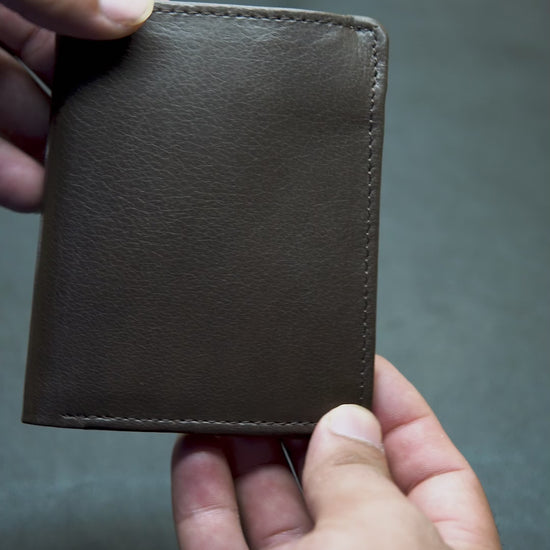 Video showing the detail view of brown leather wallet

 