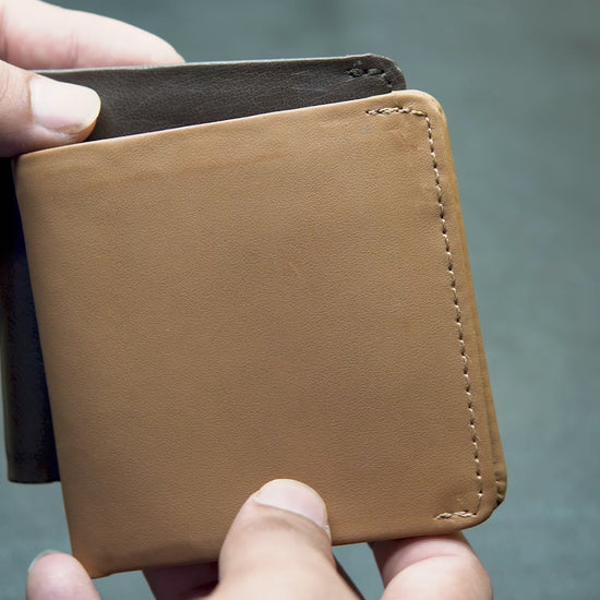 Watch demo of Bovidas Forge trifold wallet – brown leather wallet with ID window and cash storage