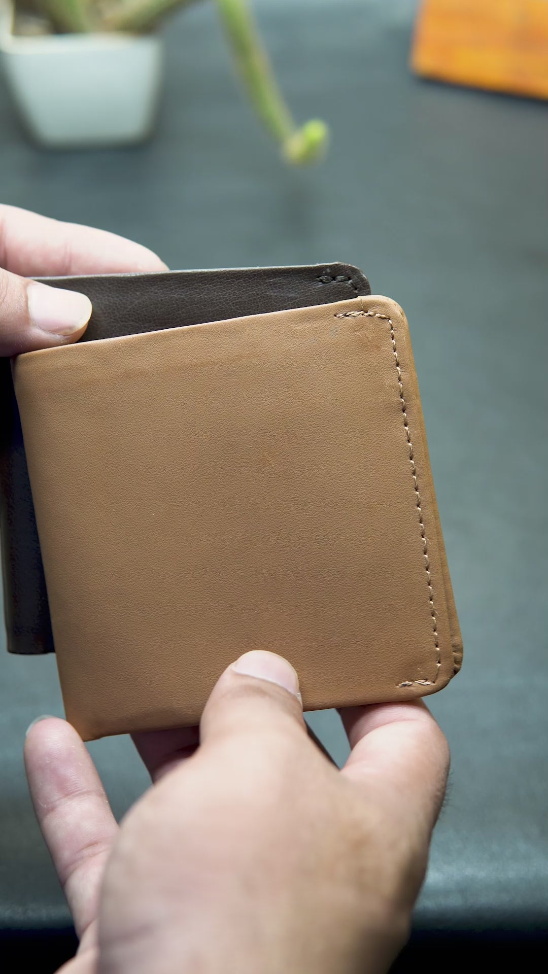 Watch demo of Bovidas Forge trifold wallet – brown leather wallet with ID window and cash storage