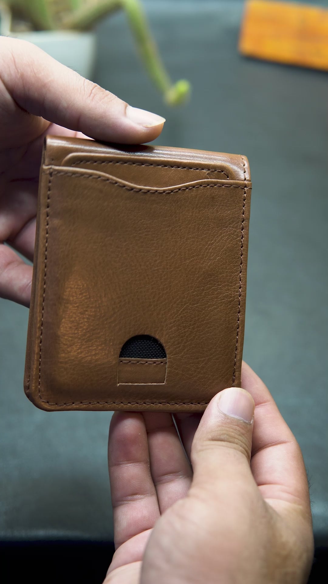 Video showing BOVIDAS FlexiFold bronze wallet with removable insert, card slots, and full interior view