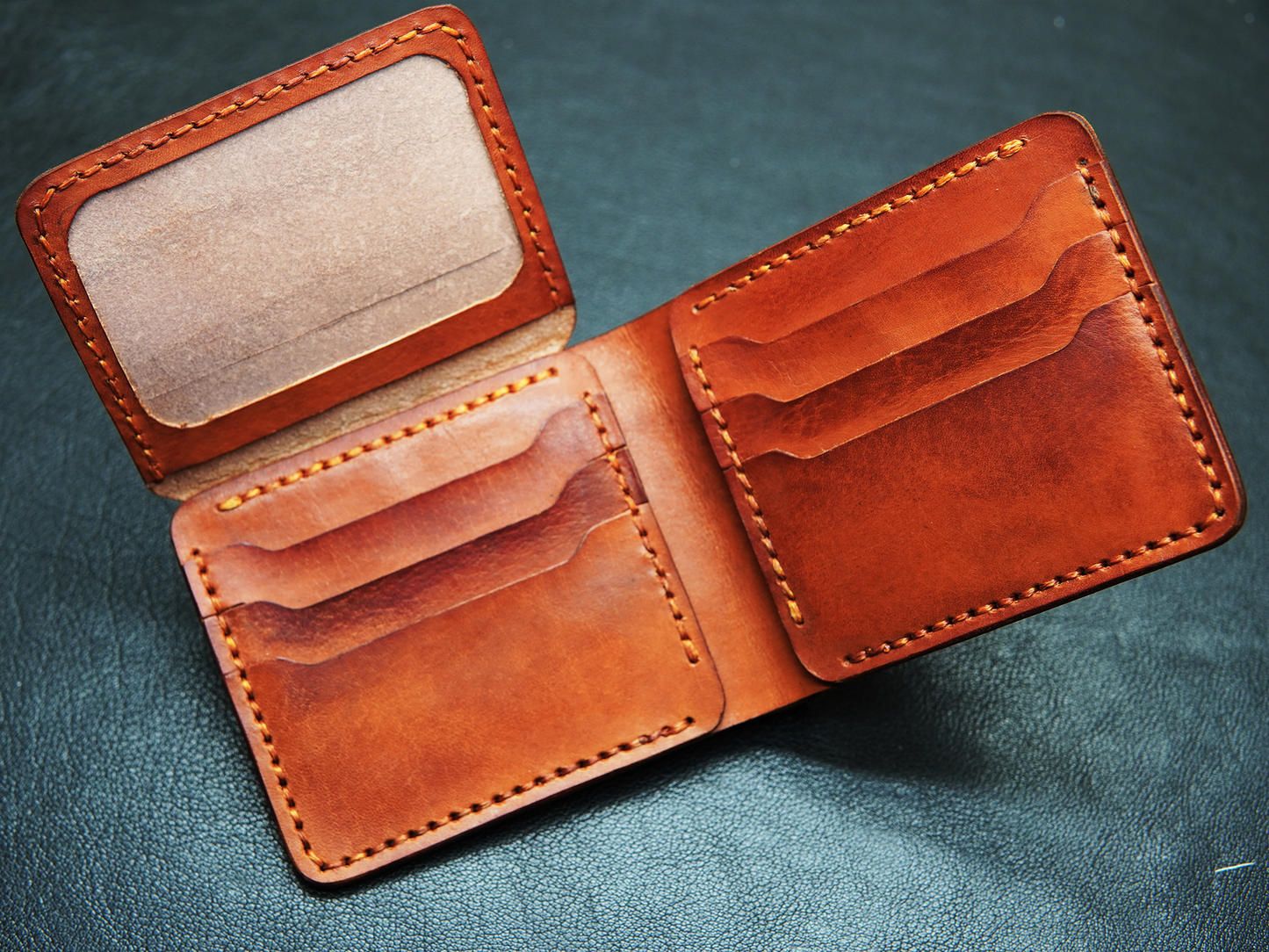rustic orange leather  wallet showing 3+3 card slots and ID window